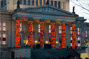 photo of Berlin building covered in life jackets